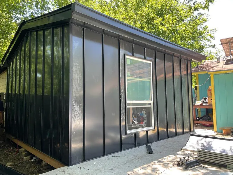 Black standing seam metal wall panels for Roof Inspection in Crawfordsville